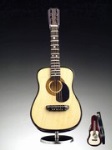 400141 Miniature Guitar w/Pick Guard and Case (7") . Music Treasures